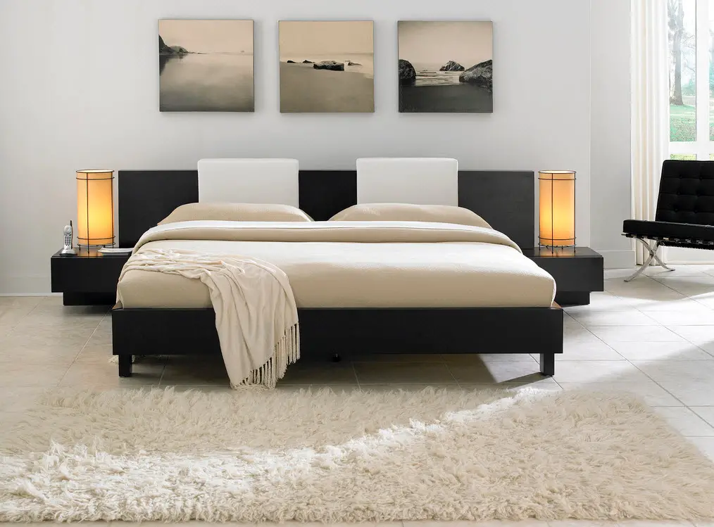 modern bedroom with large low bed