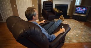 man lounged on lift reclining chair