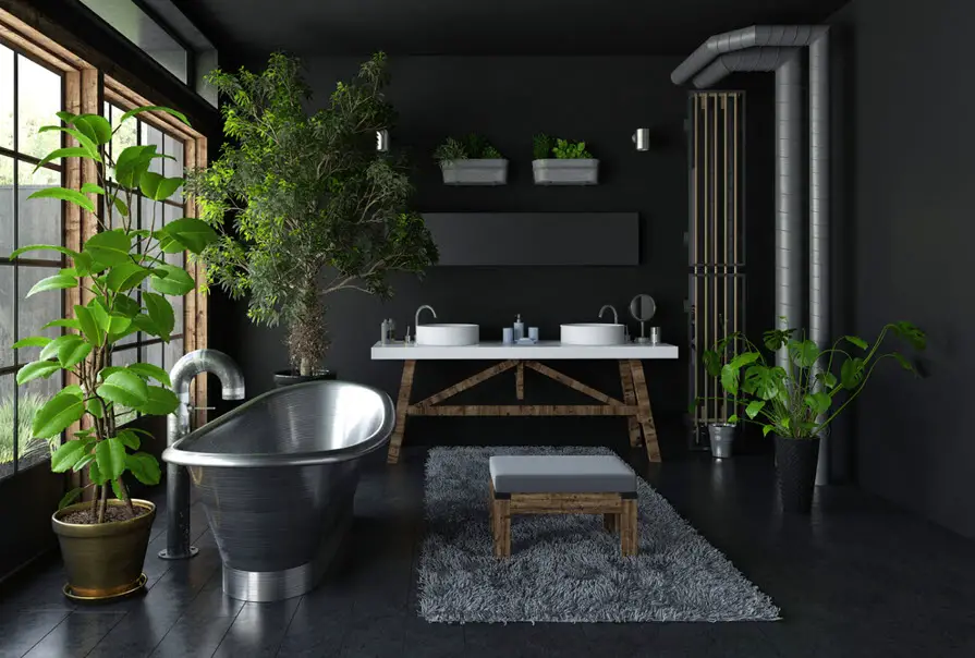industrial style bathroom with metal tub and plants